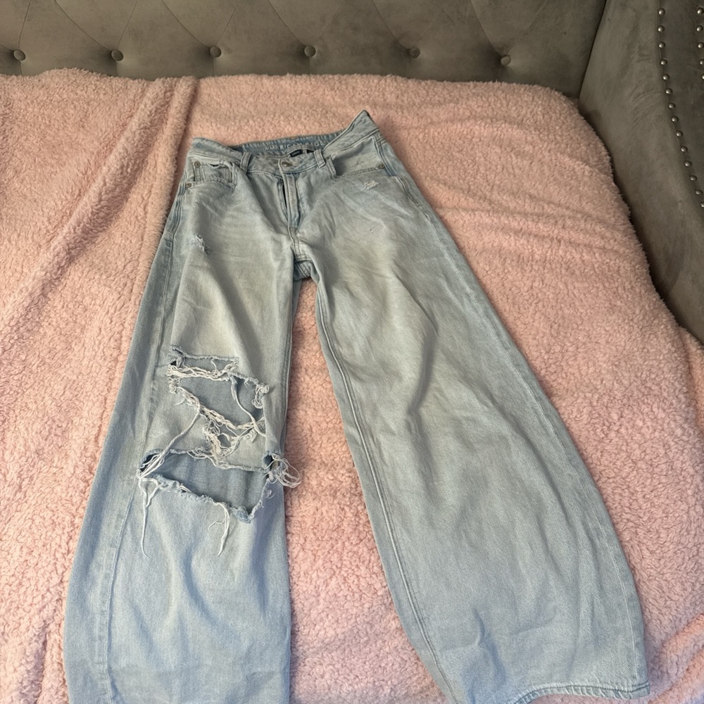 Women's Distressed Light Blue Jeans